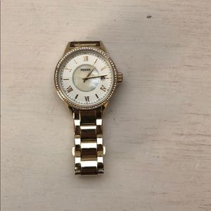 Gold Fossil watch with rhinestones